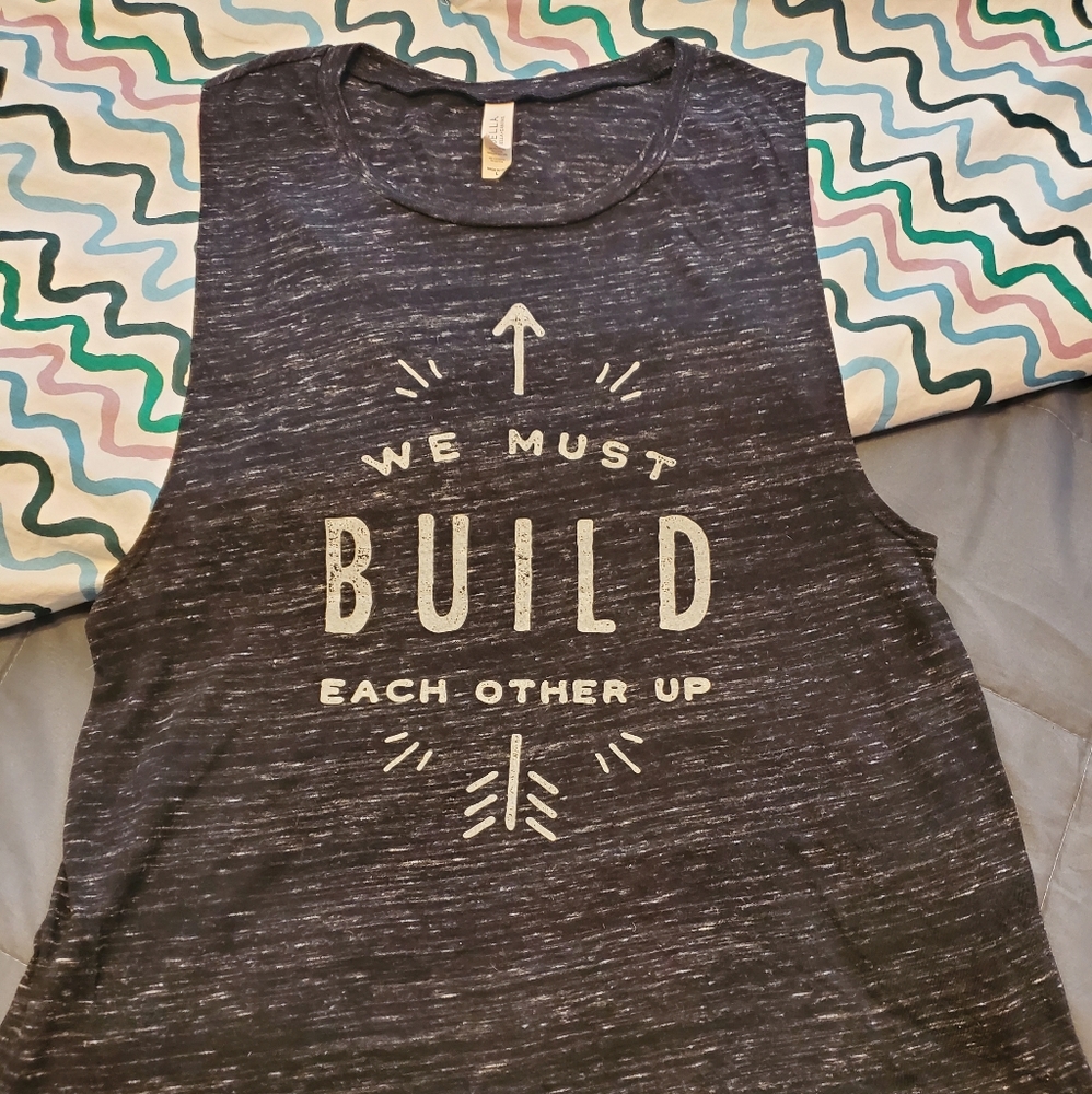 'We must build..' muscle tank.